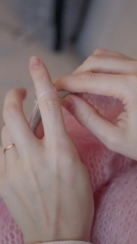Vertical Close Up of Knitting Pink Wool by Hand Stock Footage 331161707
