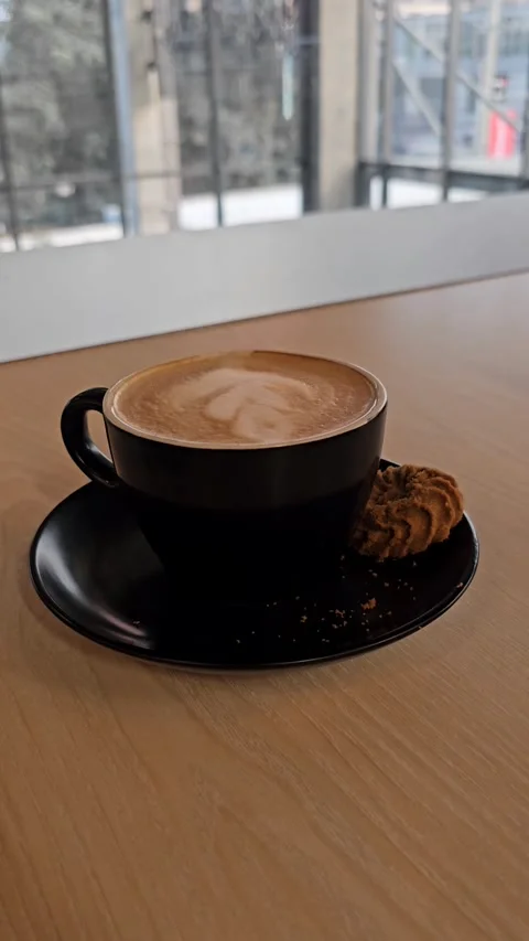 Vertical Close-Up of Latte Coffee Cup Stock Footage 327923351