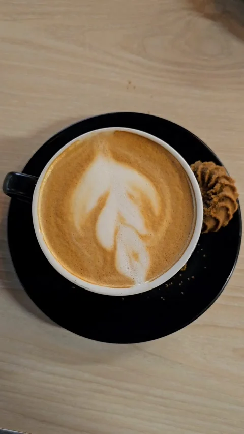 Vertical Close-Up of Latte Coffee Cup Stock Footage 327923354