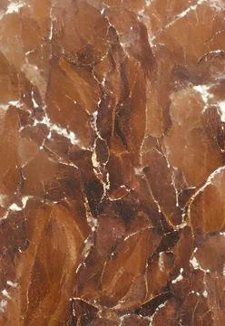 Vertical close-up orange-colored marble stone pattern great match for background Stock Photos