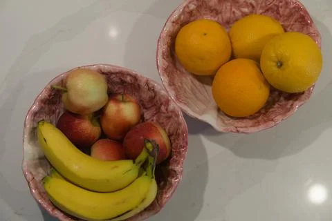 Vertical Close Up of Oranges in Ceramic Fruit Bowl Stock Photos