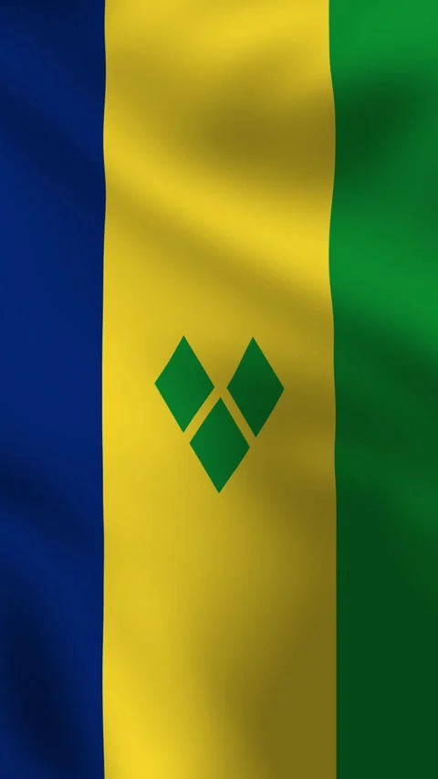Vertical, close up portrait waving flag of Saint Vincent and the Grenadines. 動画素材 299610915