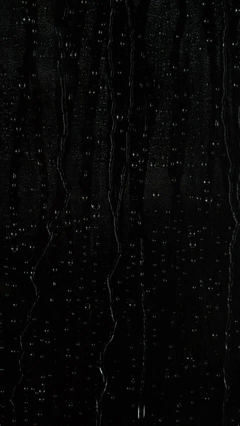 Vertical close-up rain water drops, raindrops texture on black window background Stock Footage 302782518