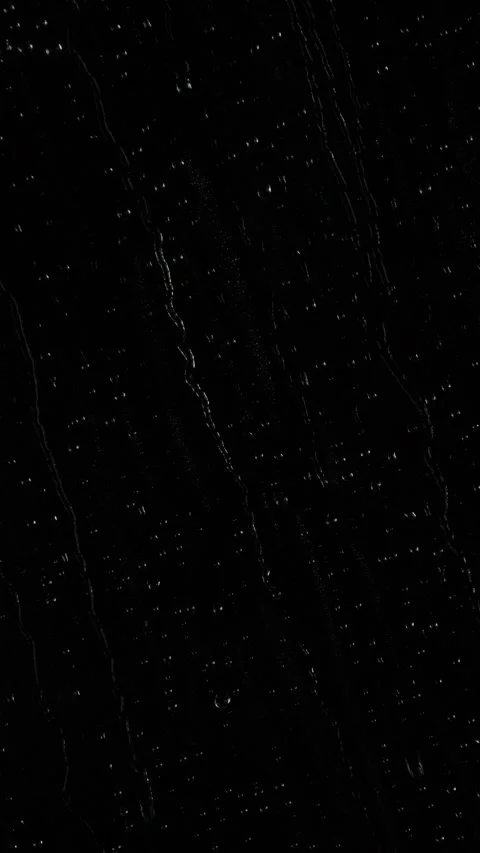Vertical close-up rain water drops, raindrops texture on black window background Video stock 306040955