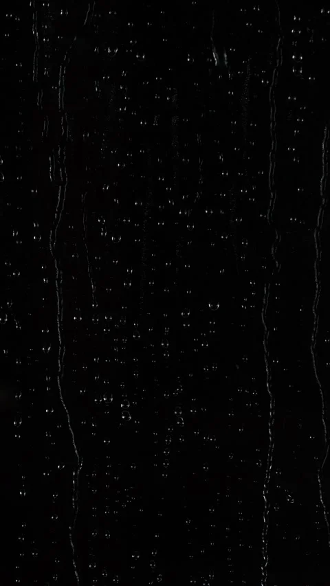 Vertical close-up rain water drops, raindrops texture on black window background 스톡 동영상 308906114
