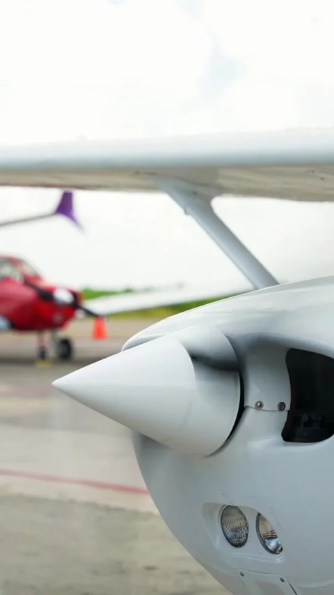 Vertical close-up of rotating propeller of a small single engine airplane on Stock Footage 292593072
