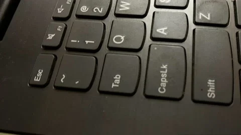 Vertical close up shot of black laptop keyboard Stock-Footage 137609386