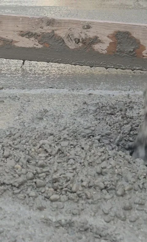 Vertical Close Up of Smoothing Sloped Concrete Surface Stock Footage 334802628