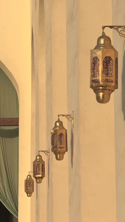 Vertical Close Up of Traditional Arabic Brass Lanterns on Mosque Wall Stock Footage 341912255