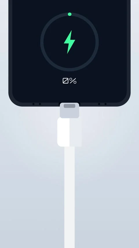 Vertical close up of a USB C cable plugging into a smartphone port and charging Stock Footage 348618013