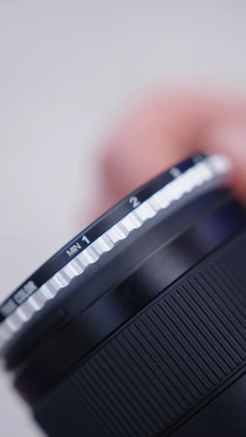 Vertical close up of variable nd filter strength numeration attached on Vídeos de archivo 282855765