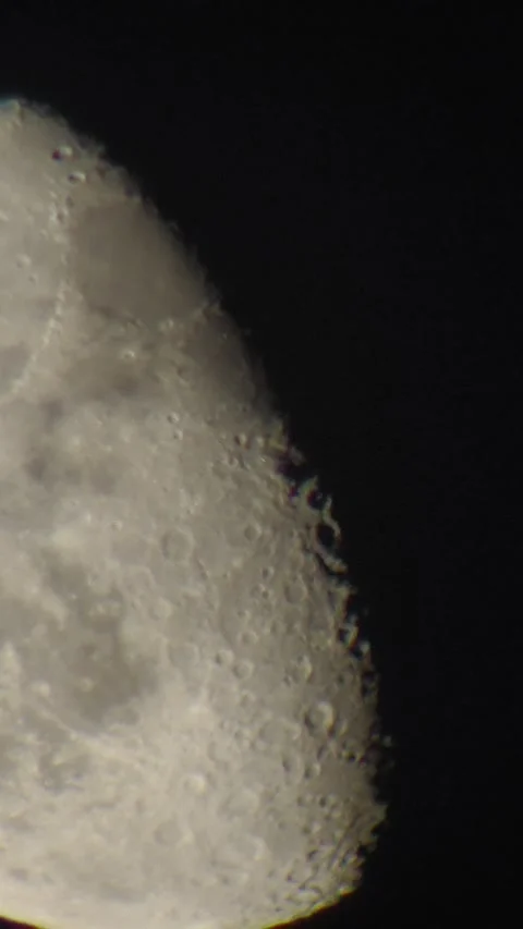 Vertical Close-Up Video Panning Across the Moons Surface Stock Footage 317914316
