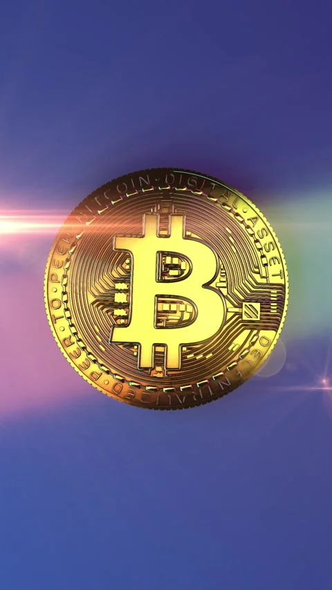 Vertical Close Up View of Golden Bitcoin Coin with Lens Flare Video stock 346369716