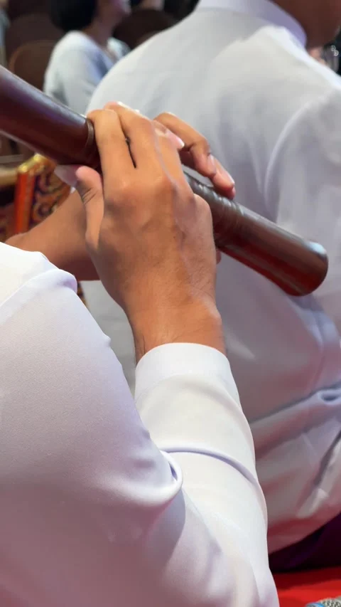 Vertical Close Up View Of Musician Finger Position On Khlui Bamboo Flute Stock Footage 345710552