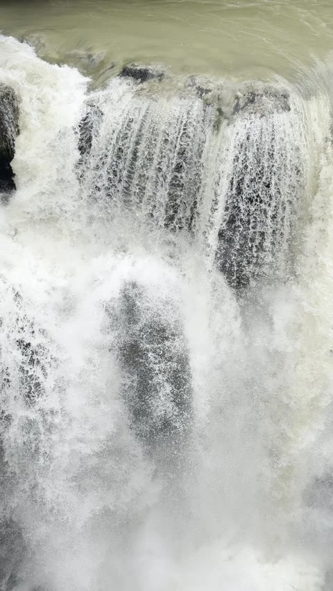 Vertical close-up waterfall crashing over rocks, Georgia Stock Footage 345967417