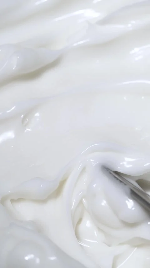 Vertical close-up white smooth skin cream texture, beauty facial cosmetics mask Stock Footage 268168657