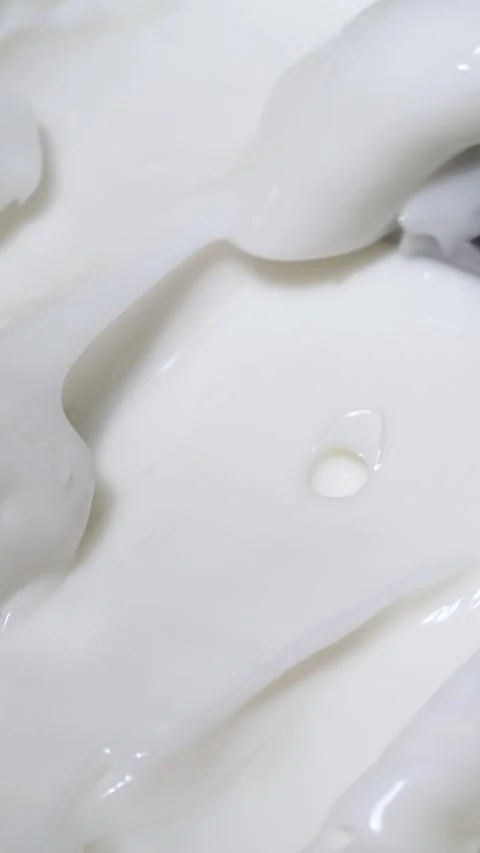 Vertical close-up white smooth skin cream texture, beauty facial cosmetics mask Stock Footage 270894897