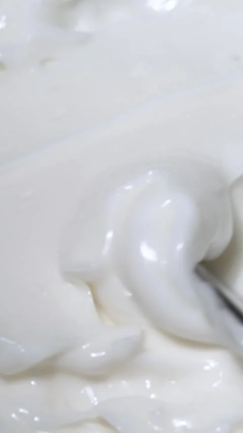 Vertical close-up white smooth skin cream texture, beauty facial cosmetics mask Video stock 271616049