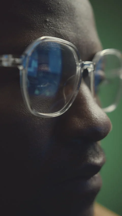 Vertical Closeup of Male Programmer in Eyeglasses Stock Footage 259934950