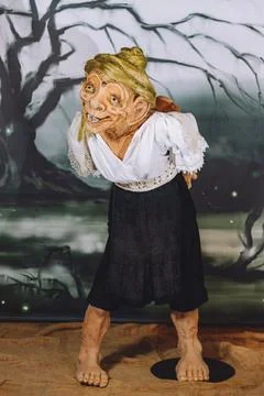 Vertical closeup of a modeled old witch that stole children from old legends Stock Photos