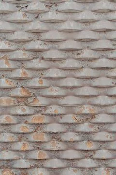 Vertical closeup shot of a bumpy wall surface Stock Photos