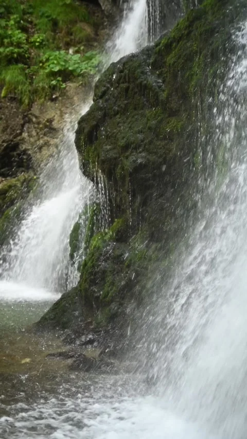 Vertical closeup shot of the main waterfall at Josephsthaler Wasserfälle Stock-Footage 260899898