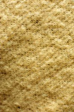 Vertical closeup shot of a rough textured brown surface 스톡 사진