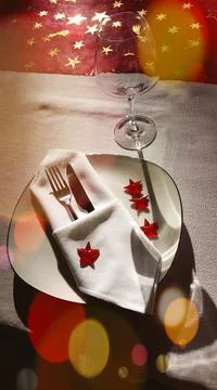 Vertical closeup shot of table setting for one persona Stock Photos