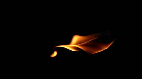 Vertical closeup torch fire flame burning over black background in slow motion Stock Footage 252791843