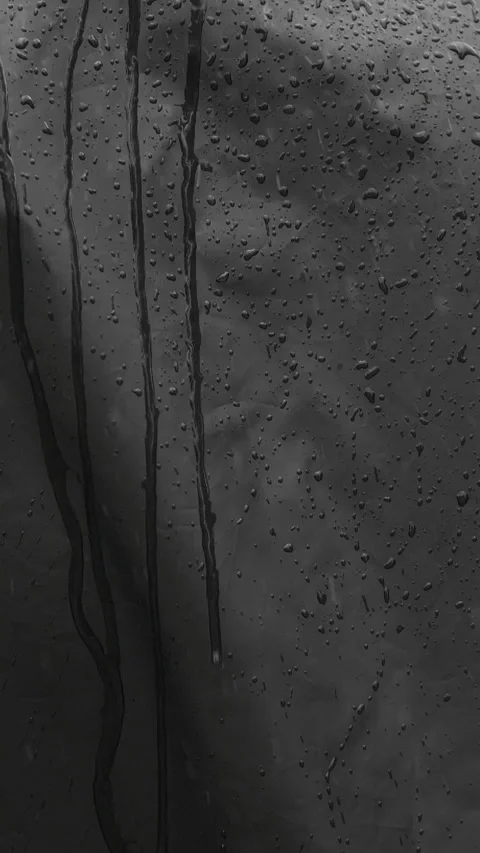 Vertical closeup video of black waterproof fabric in heavy rain with water drops Stock Footage 276204585