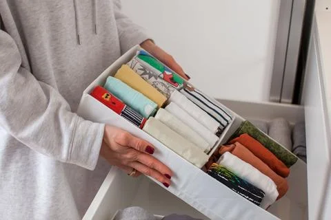 Vertical clothing storage ideas. Stock Photos