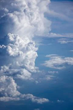 Vertical clouds background with blue sky. Stock-Fotos
