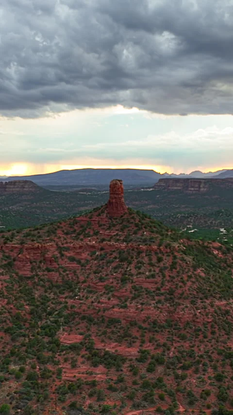 Vertical - Cloudy Sunset Sky Over Sedona's Chimney Rock Atop Red Mesa With Stock Footage 308202201