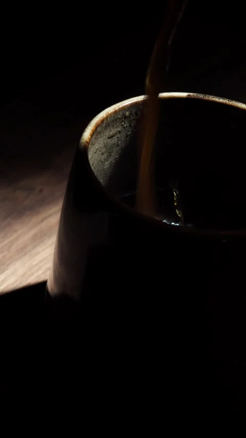 Vertical Coffee Pouring Ceramic Cup ASMR Sound Dark 4K Stock Footage 325346900