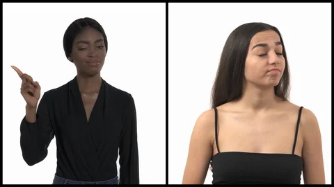 Vertical collage of two beautiful multiracial women expressing Rejection with Stock Footage 129570723