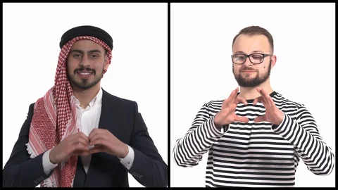 Vertical collage of a two handsome young men putting hands in heart shape. Body Stock Footage 129749254