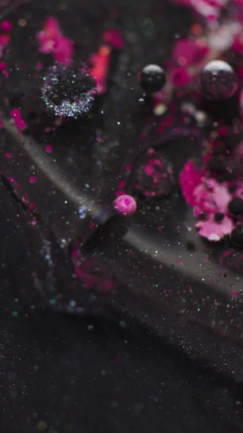 Vertical color blob paint fluid oil glitter flow Video stock 334092804