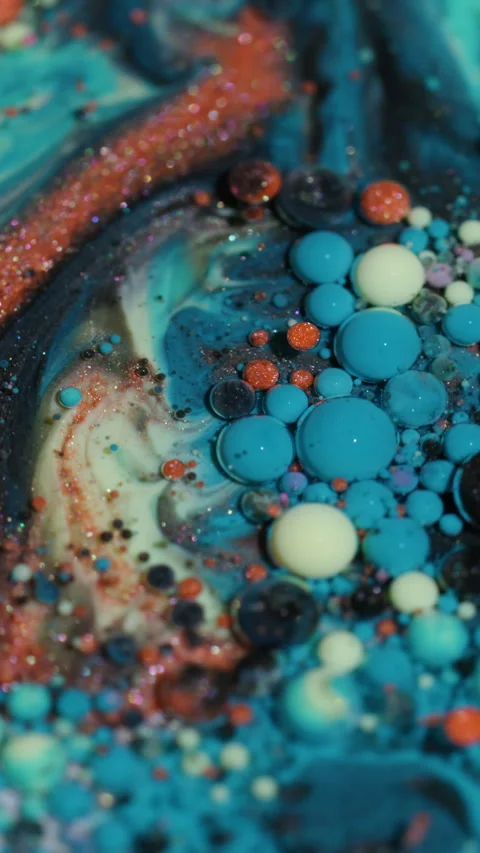 Vertical color bubble oil fluid ink glitter water Stock Footage 333984624