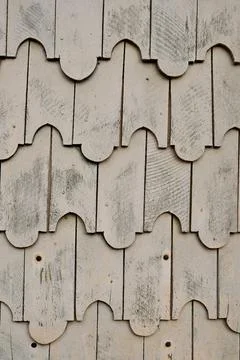 Vertical color close-up image of old wooden tile pattern facade Stock Photos