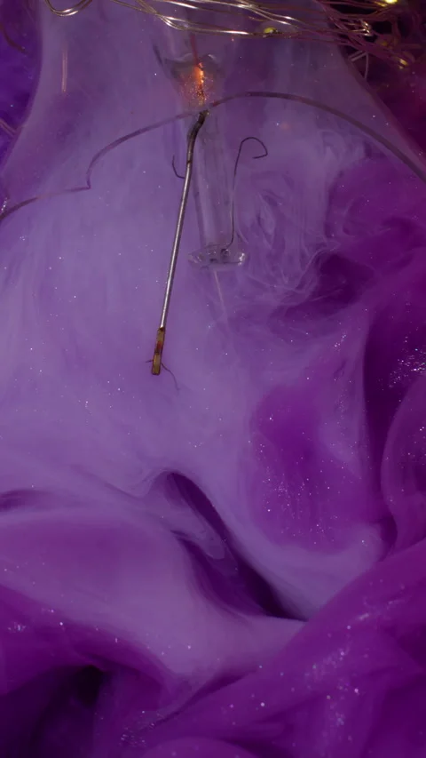 Vertical color mist ink explode smoky light bulb Stock Footage 315197945