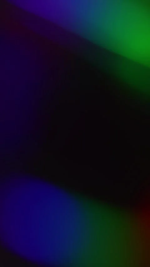 Vertical Colorful Light Leaks and Prism Bokeh on Black Background Stock Footage 345089970