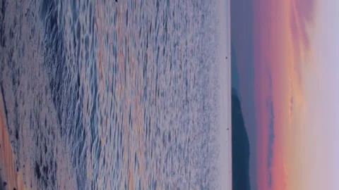 Vertical, Colorful Sunset on the Beach Time Lapse. Amazing Purple Blue Yellow Pi Video stock 305642185
