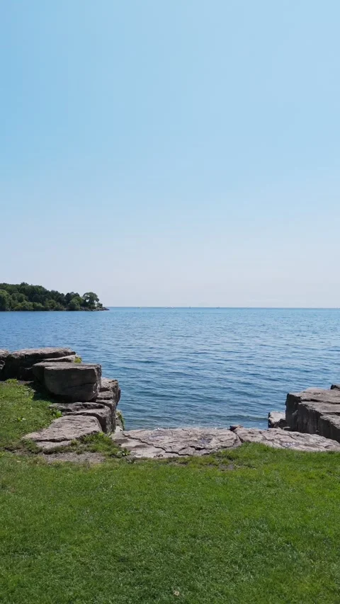 A vertical composite image of shimmering water and sailboats. Stock Footage 341452322