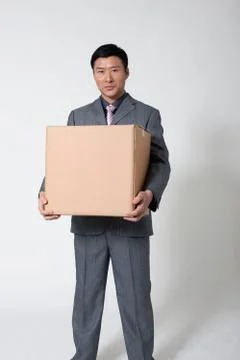 Vertical composition Face the camera. Manager a man Oriental figures Stock Photos