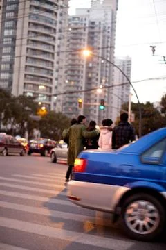 Vertical composition Transportation Hand in arm together Dusk Taxi Residential Stock Photos