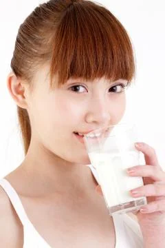 Vertical composition Young woman Drink Oriental figures Asian Asia Asians Stock Photos