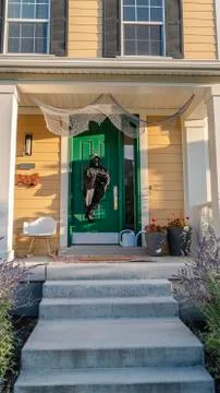 Vertical Concrete path and steps to a front door of a house Stock Photos