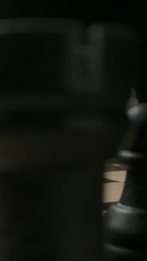 Vertical of Confrontation between black and white chess pieces. The beginning of Stock Footage 276765947