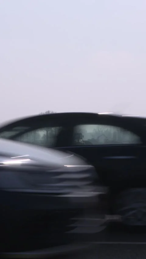 Vertical - construction site for a bypass roadway + traffic passes by Stock Footage 313279418