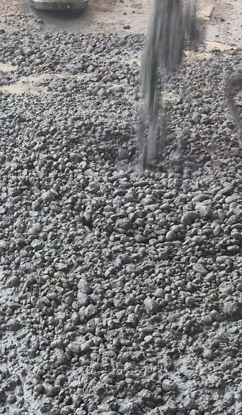 Vertical Construction Workers Raking Coarse Concrete 9x16 Stock Footage 341731122